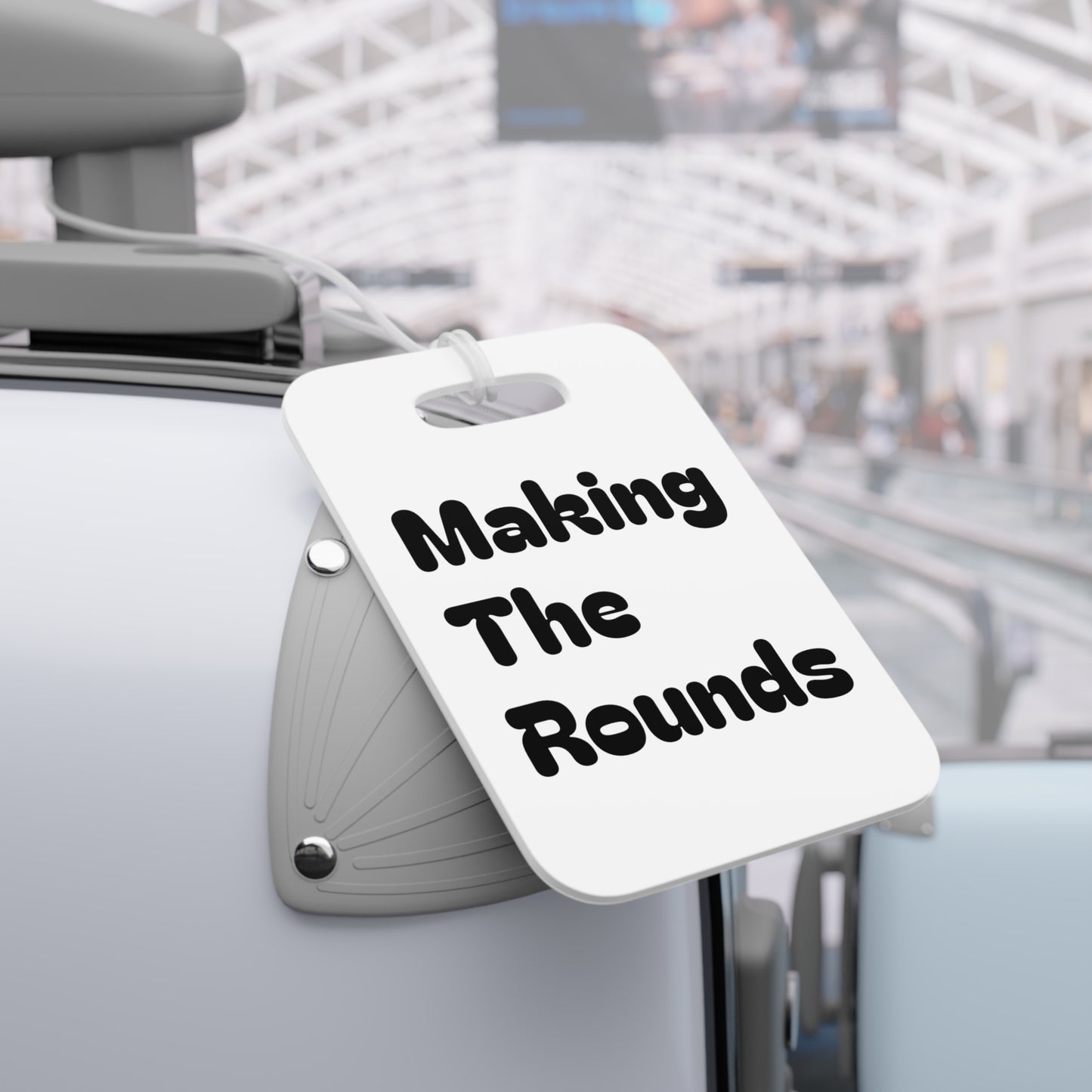 Making The Rounds black luggage tags